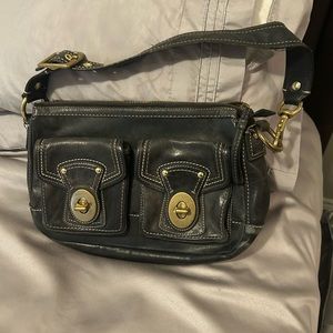 Women’s black coach medium size purse and leather